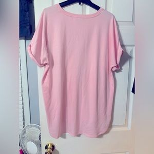 Causal dressy soft light pink blouse. Never dried. Soft to the touch. Like new.